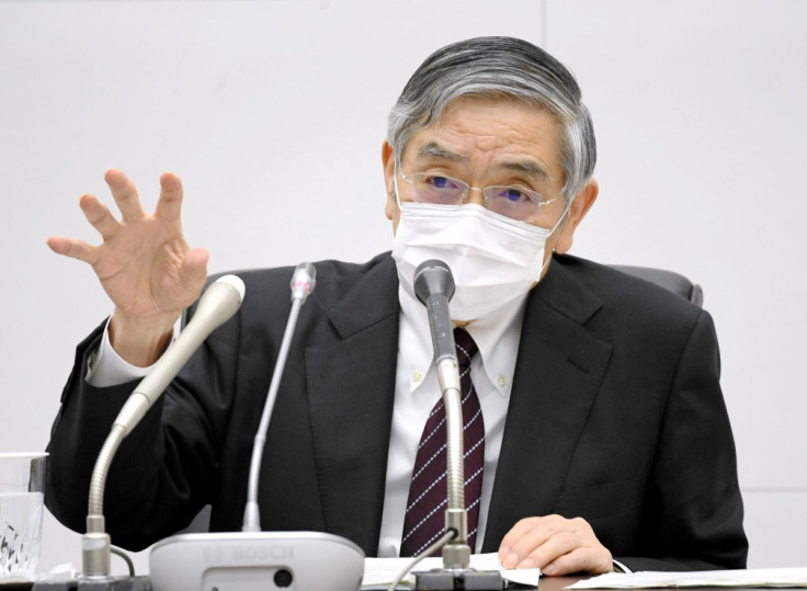 Bank of Japan Governor Haruhiko Kuroda wearing a protective face mask attends a news conference as the spread of the coronavirus disease (COVID-19) continues in Tokyo, Japan, April 27, 2020, in this photo released by Kyodo. Mandatory credit Kyodo/via REUT