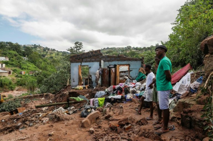 The remains of a house at KwaNdengezi township near Durban -- 10 people in the township are listed as missing