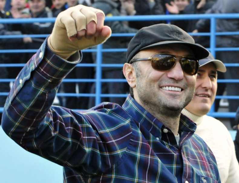 Dagestani born tycoon Suleiman Kerimov watches a soccer match between Anzhi and CSKA in Makhachkala December 2, 2012. 