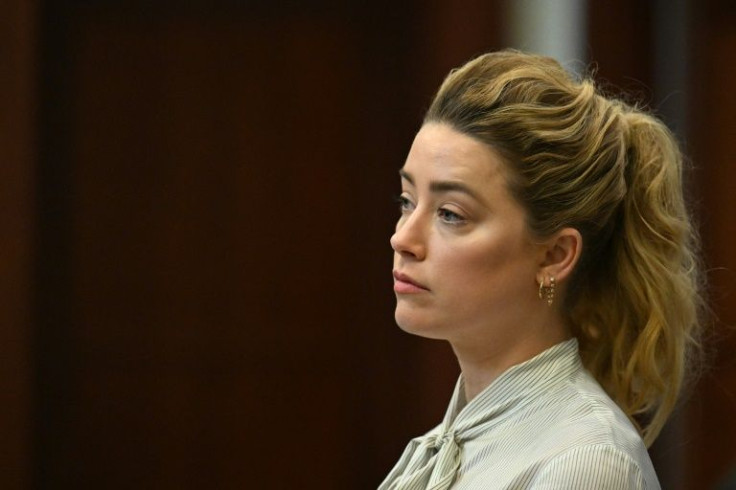 US actress Amber Heard listens to testimony in Fairfax County Circuit Court