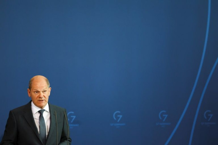 German Chancellor Olaf Scholz addressed a press conference following a video call with world leaders on Ukraine at the Chancellery in Berlin