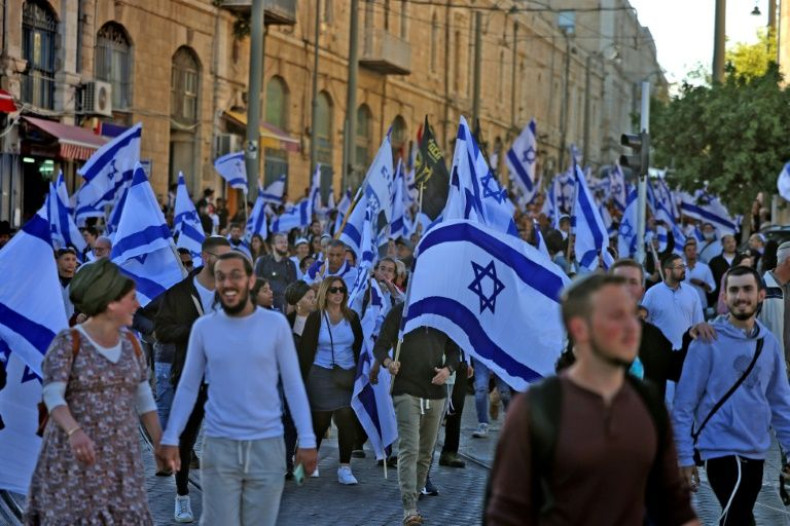 Many of the protesters carried the Israeli flag
