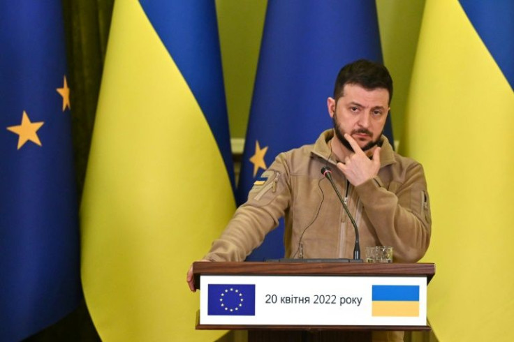 Ukraine's President Volodymyr Zelensky reacts during a press conference following his talks with President of the European Council in Kyiv