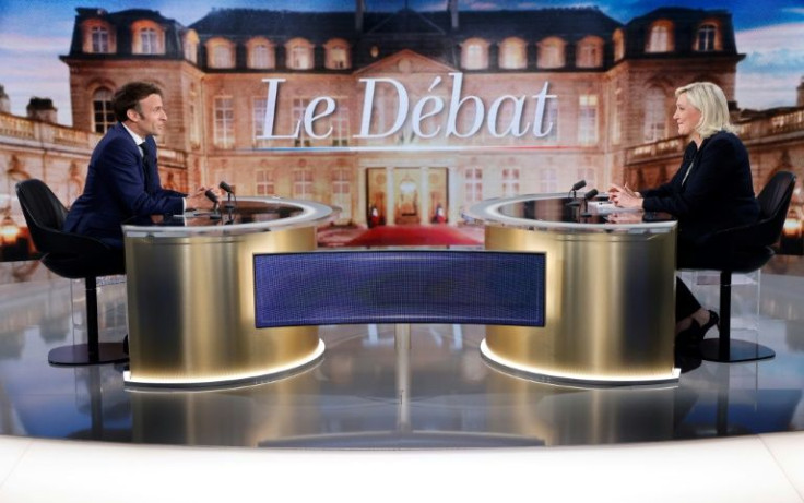 French voters face a stark choice between the centrist president Macron and the anti-immigration Le Pen