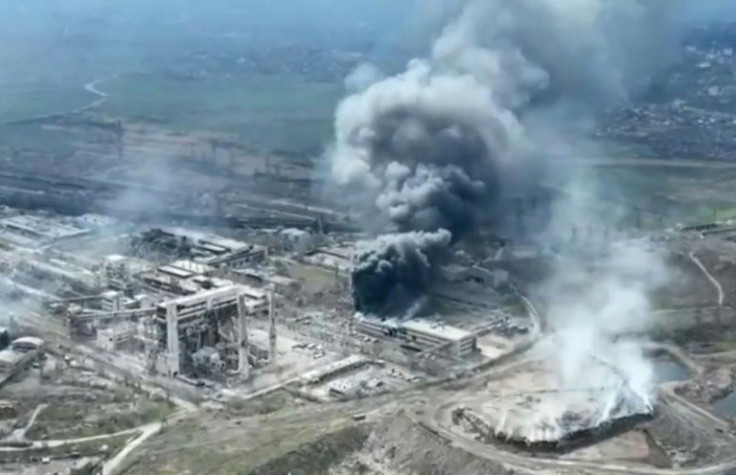 A handout video grab released by Mariupol City Council on April 19 showed smoke billowing above the Azovstal steel plant