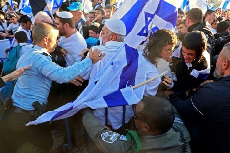 Jewish ultra-nationalists clash with Israeli police  barring them from parading through the Muslim quarter of annexed east Jerusalem