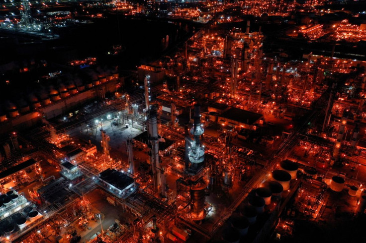 A nighttime view of Marathon Petroleum's Los Angeles Refinery, which processes domestic & imported crude oil into gasoline, diesel fuel, and other refined petroleum products, in Carson, California, U.S., March 11, 2022. Picture taken with a drone.