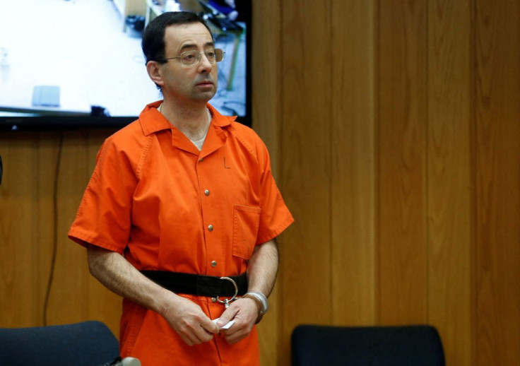 Larry Nassar, a former team USA Gymnastics doctor who pleaded guilty in November 2017 to sexual assault charges, stands in court during his sentencing hearing in the Eaton County Court in Charlotte, Michigan, U.S., February 5, 2018.  