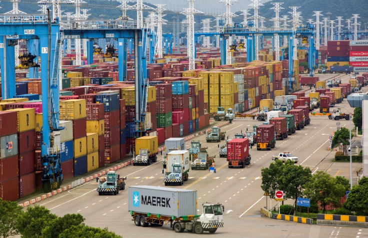 Lines of trucks are seen at a container terminal of Ningbo Zhoushan port in Zhejiang province, China, August 15, 2021. cnsphoto via REUTERS