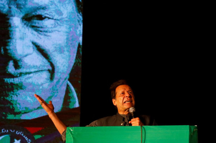 Ousted Pakistani Prime Minister Imran Khan gestures as he addresses supporters during a rally, in Karachi, Pakistan April 16, 2022.