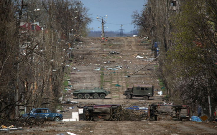 A view shows barriers made of vehicles on a road during Ukraine-Russia conflict in the southern port city of Mariupol, Ukraine April 21, 2022. 