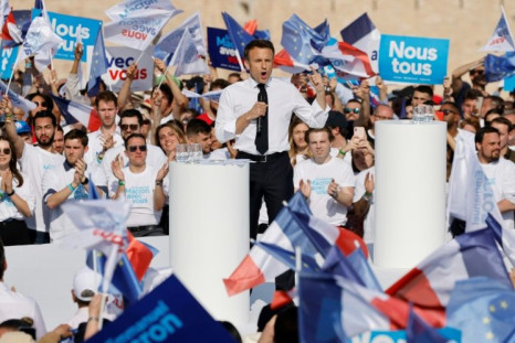 French President Emmanuel Macron's campaign slogan is 'All of us' but many on the left call him the 'President of the rich'