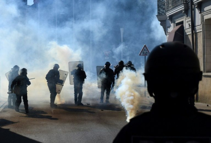 Riot police fire tear gas in the French city of Nantes -- which voted for the left -- at a protest against the far right ahead of French elections Sunday