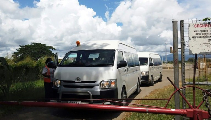 A frame grab shows the US diplomatic team being taken from the airport for talks with the Solomons Islands' government in Honiara.