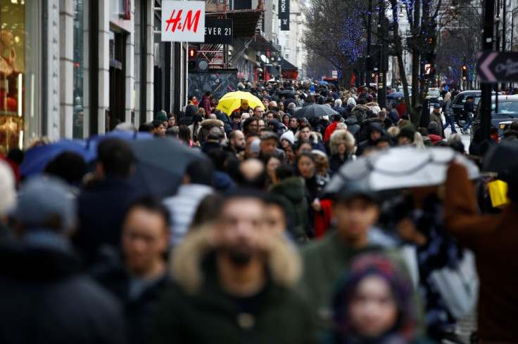 Shoppers walk on Oxford Street during Boxing Day sales in central London, Britain, December 26, 2019. 