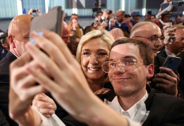 Le Pen is hoping that opinion polls giving an edge to Macron will be proved wrong on Sunday.