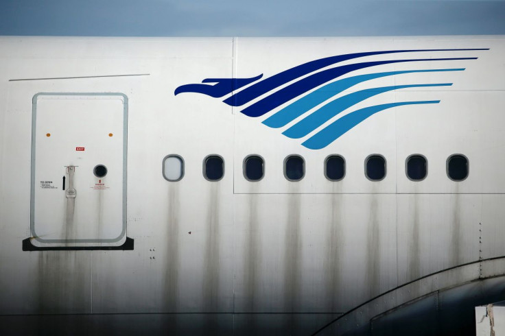 The Garuda Indonesia's sign is seen on its aeroplane parked at the Garuda Maintenance Facility (GMF) AeroAsia, at Soekarno-Hatta International airport near Jakarta, Indonesia, January 21, 2022. 