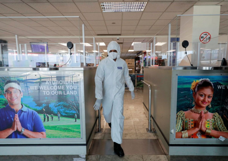 An officer wearing protective gear walks inside the airport as Sri Lanka's government scheduled to reopen the country's airports for tourists from January 21, 2021, as they were closed since March 2020 due to spread of coronavirus disease (COVID-19), at
