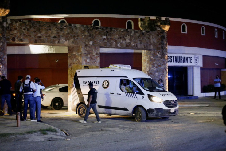 A forensic vehicle transporting the body of a woman found inside a water tank, leaves the Nueva Castilla Motel, near the place where Debanhi Escobar, an 18-year old student, has been missing since April 9, in Escobedo, Mexico April 22, 2022. 
