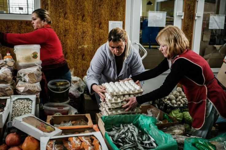In Lysychansk, only a single small market remains functional, with residents gathering every morning to procure supplies