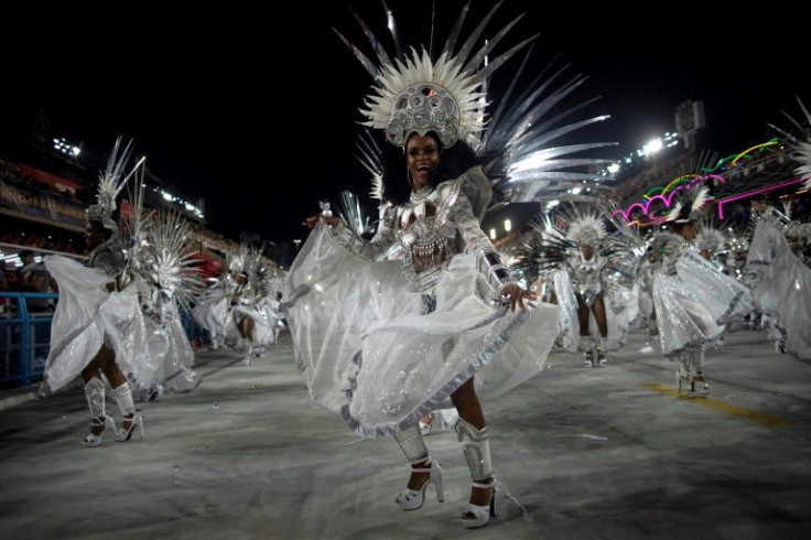 Each samba school in the competition has 60 to 70 minutes to tell a story in music and dance, to be evaluated on nine criteria by the jury