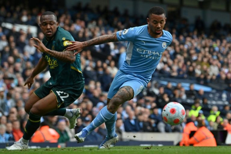 Four-midable: Gabriel Jesus (right) scored four goals as Manchester City beat Watford 5-1