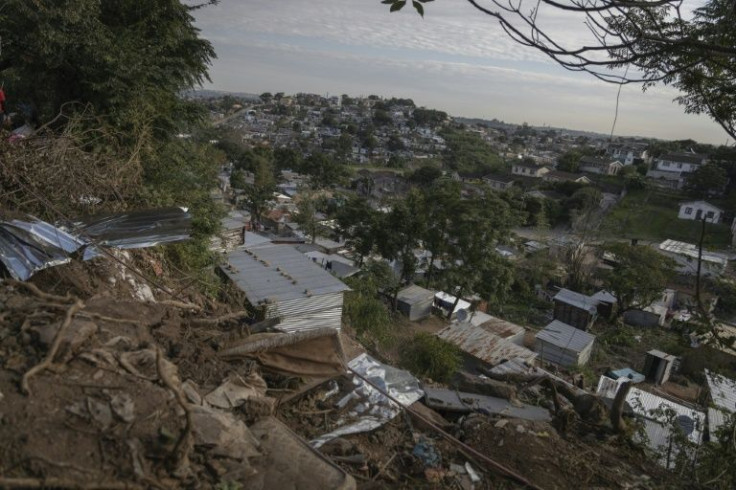 Dozens of shacks vanished in seconds when the ground, over-saturated with flood water -- crumbled at Durban's  informal settlement of eNkanini