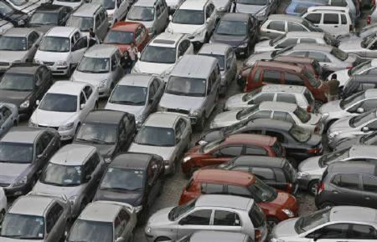 Vehicles are seen at a parking lot in New Delhi February 9, 2010.