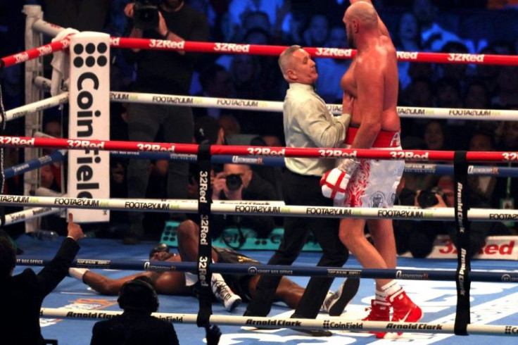 A stricken Dillian Whyte lies flat out on the canvas after being felled by Tyson Fury's uppercut at the end of the sixth round