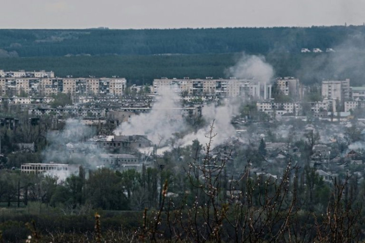Smoke rises after shelling in Rubizhne, on April 22, 2022