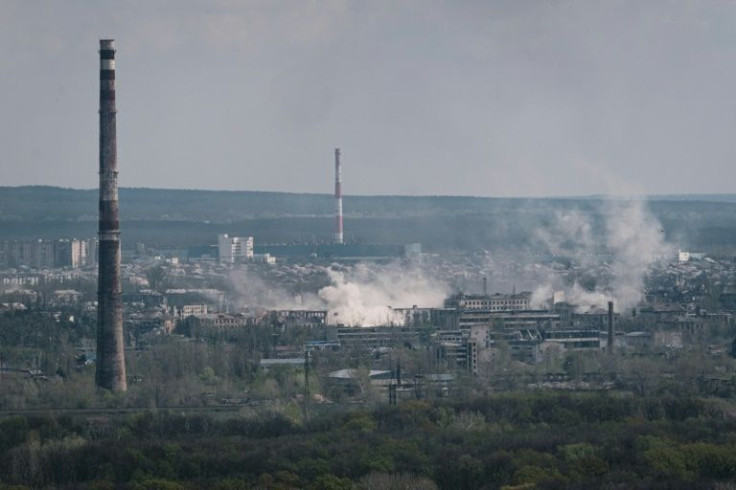Smoke billows over the frontline town of Rubizhne