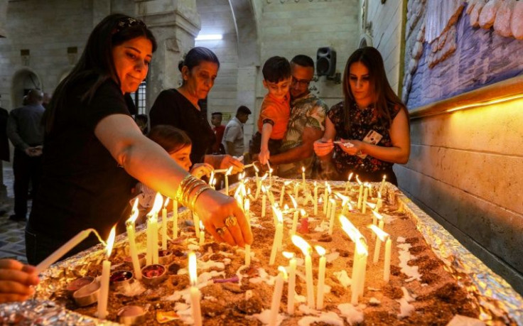 Iraqi Orthodox Christians celebrate Easter at the church of the ancient Mor Mattai Monastery in the village of Bashiqa