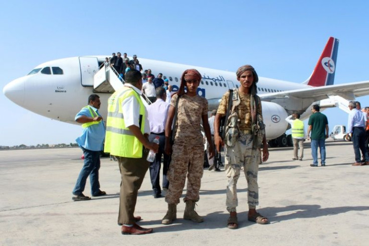 Yemenia airplanes fly regularly to the government-controlled southern city of Aden; here Yemeni loyalist security forces pose as passengers disembark in Aden in this May 2016 photograph