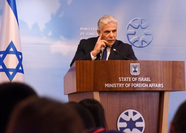 Israeli Foreign Minister Yair Lapid speaks during a press briefing on Sunday