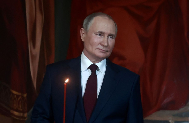 Russian President Vladimir Putin attends the Orthodox Easter service at the Cathedral of Christ the Saviour in Moscow, Russia April 23, 2022. Picture taken April 23, 2022. Sputnik/Sergei Fadeichev/Pool via REUTERS