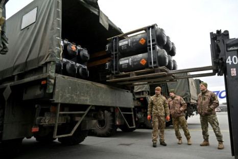 Ukrainian servicemen in Kyiv load a truck with the FGM-148 Javelin, an American man-portable anti-tank missile provided by US to Ukraine as part of continued military support in February 2022, just days before Russia invaded its neighbor