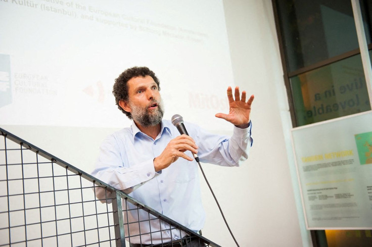 FILE PHOTO - Turkish philanthropist Osman Kavala, accused of attempting to overthrow the government and jailed since late 2017 without a conviction, speaks during an event in this undated handout photo. Anadolu Kultur/Handout via REUTERS
