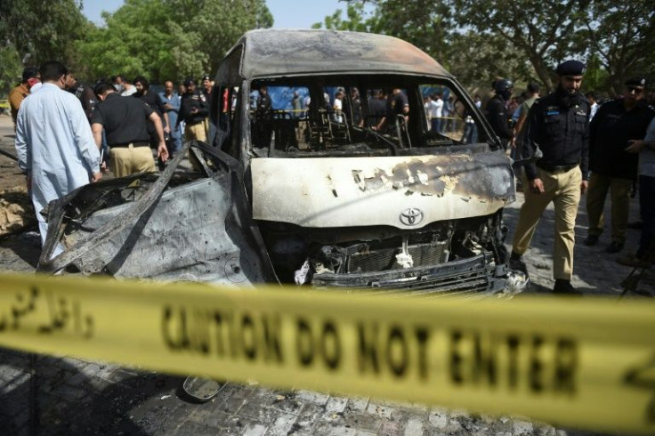 The remains of the bus targeted by a suicide bomber in Karachi