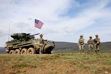 Soldiers from U.S. Army Stryker company take part in a joint training with military personnel and vehicles of Bulgaria's Armed Forces at Novo Selo grounds, in Bulgaria, April 21, 2022. 