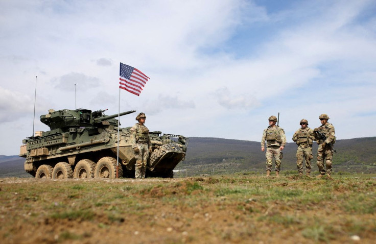 Soldiers from U.S. Army Stryker company take part in a joint training with military personnel and vehicles of Bulgaria's Armed Forces at Novo Selo grounds, in Bulgaria, April 21, 2022. 