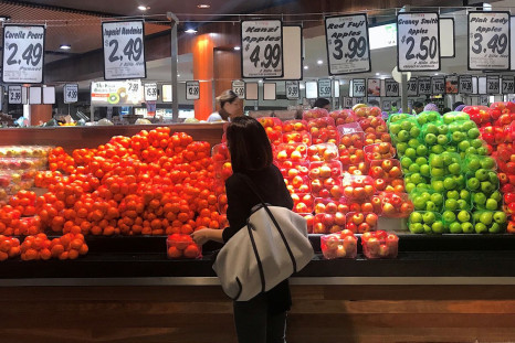 A shopper looks at a range of fruit and vegetables on sale at a store in a shopping mall in Sydney, Australia, July 28, 2017.      