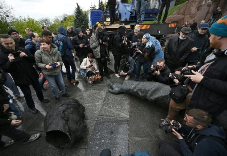 Authorities in Kyiv on April 26, 2022 began demolishing a monument symbolising historic ties between ex-Soviet Ukraine and Russia, AFP correspondents reported