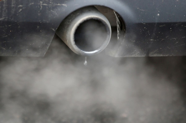 An exhaust emits fumes as a car is driven through Richmond in London, Britain December 2, 2016.  