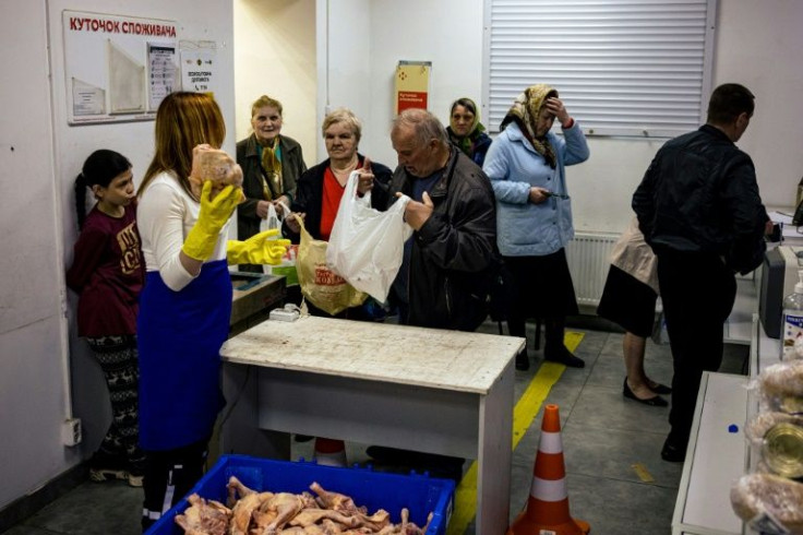 They visit several sites to pick up food including a post office that now distributes meat