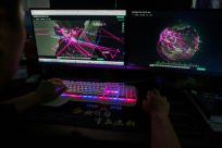 A member of the Red Hacker Alliance in Dongguan, China in August 2020 monitors cyberattacks around the world. Hacks have increased through the pandemic and the war in Ukraine