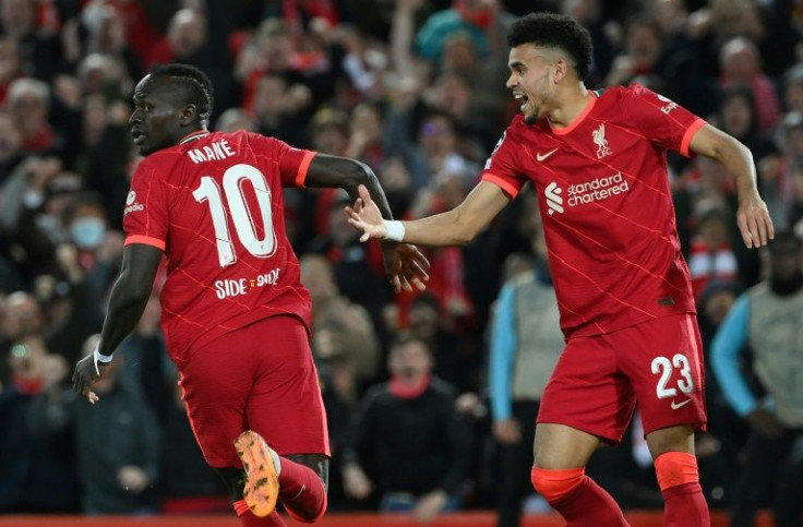 Four-midable: Liverpool remain on course for a quadruple of trophies