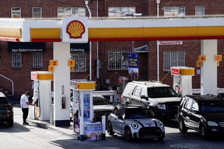 People refuel their vehicles with gasoline at a Shell gas station in Los Angeles, California, U.S., March 10, 2022. 