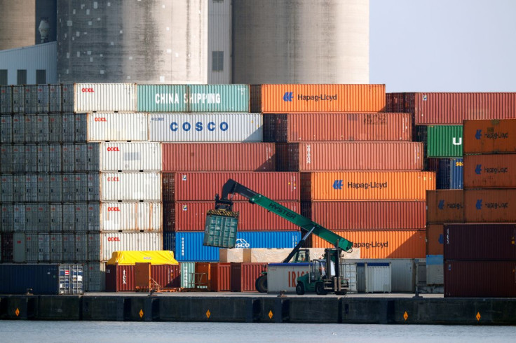 Shipping containers are stacked up at the Port of Antwerp, Belgium July 26, 2018.