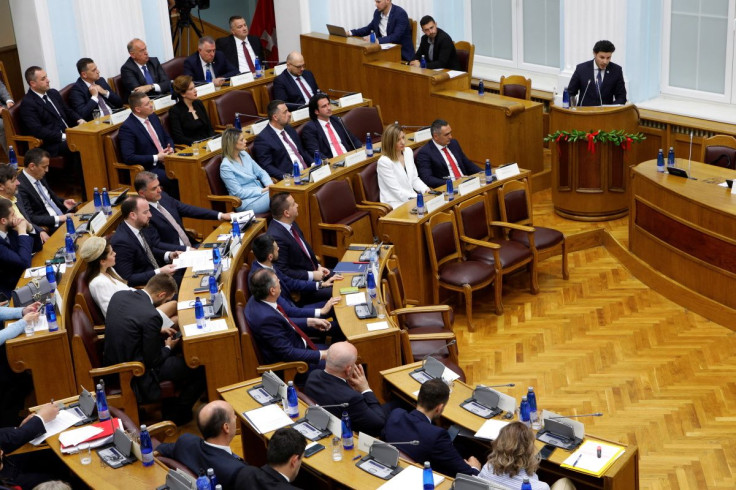 Montenegro's Prime Minister designate Dritan Abazovic addresses parliament during a session on which new government will be formed at the parliament in Cetinje, Montenegro April 28, 2022.