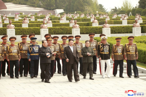 North Korean leader Kim Jong Un walks during a visit to the Revolutionary Martyrs Cemetery on Mount Daesong to mark the 90th anniversary of the founding of the Korean People's Revolutionary Army in Pyongyang, North Korea, in this undated photo released by